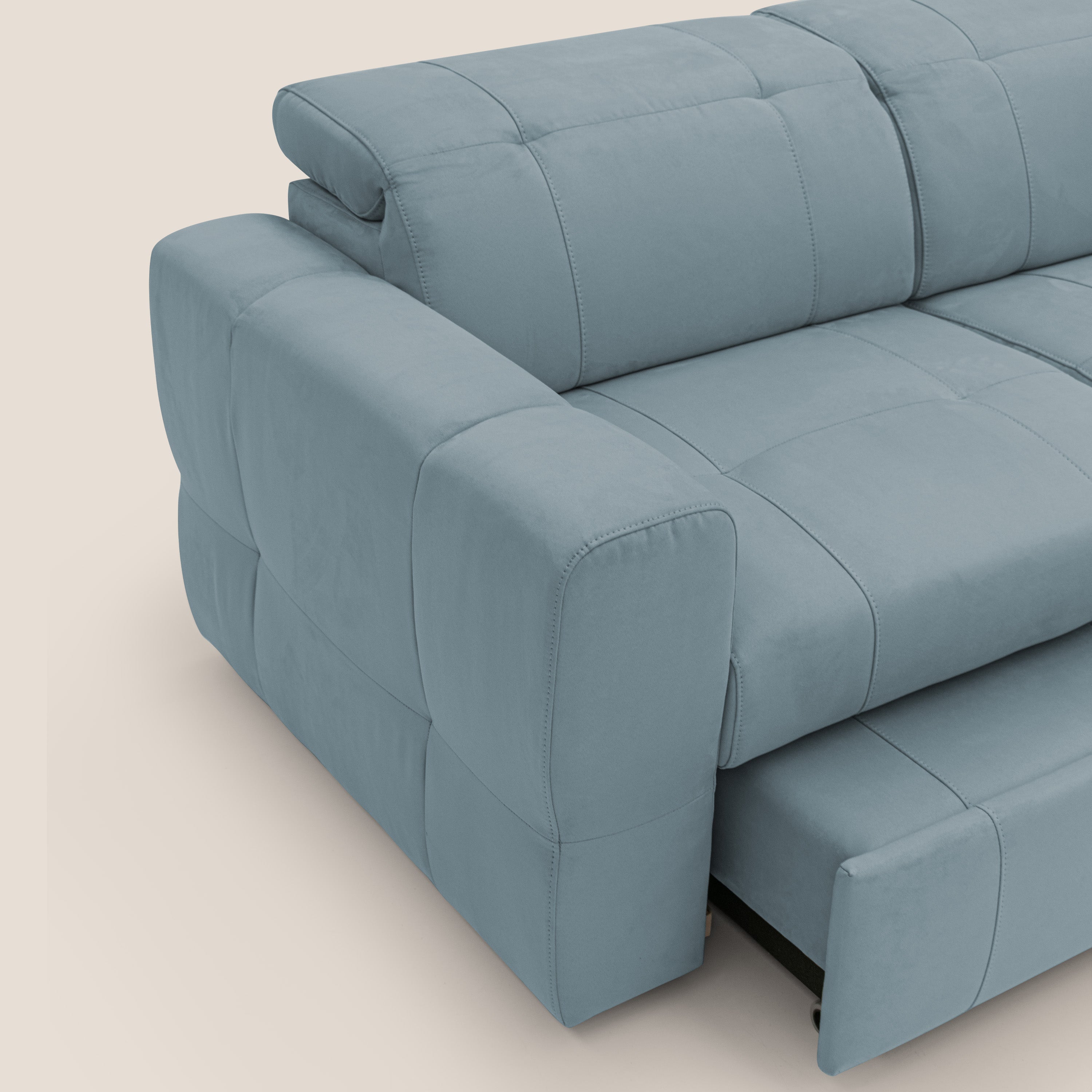 Kronos Divano angolare con pouf estraibile e penisola contenitore in microfibra impermeabile T11 carta da zucchero - divani.store