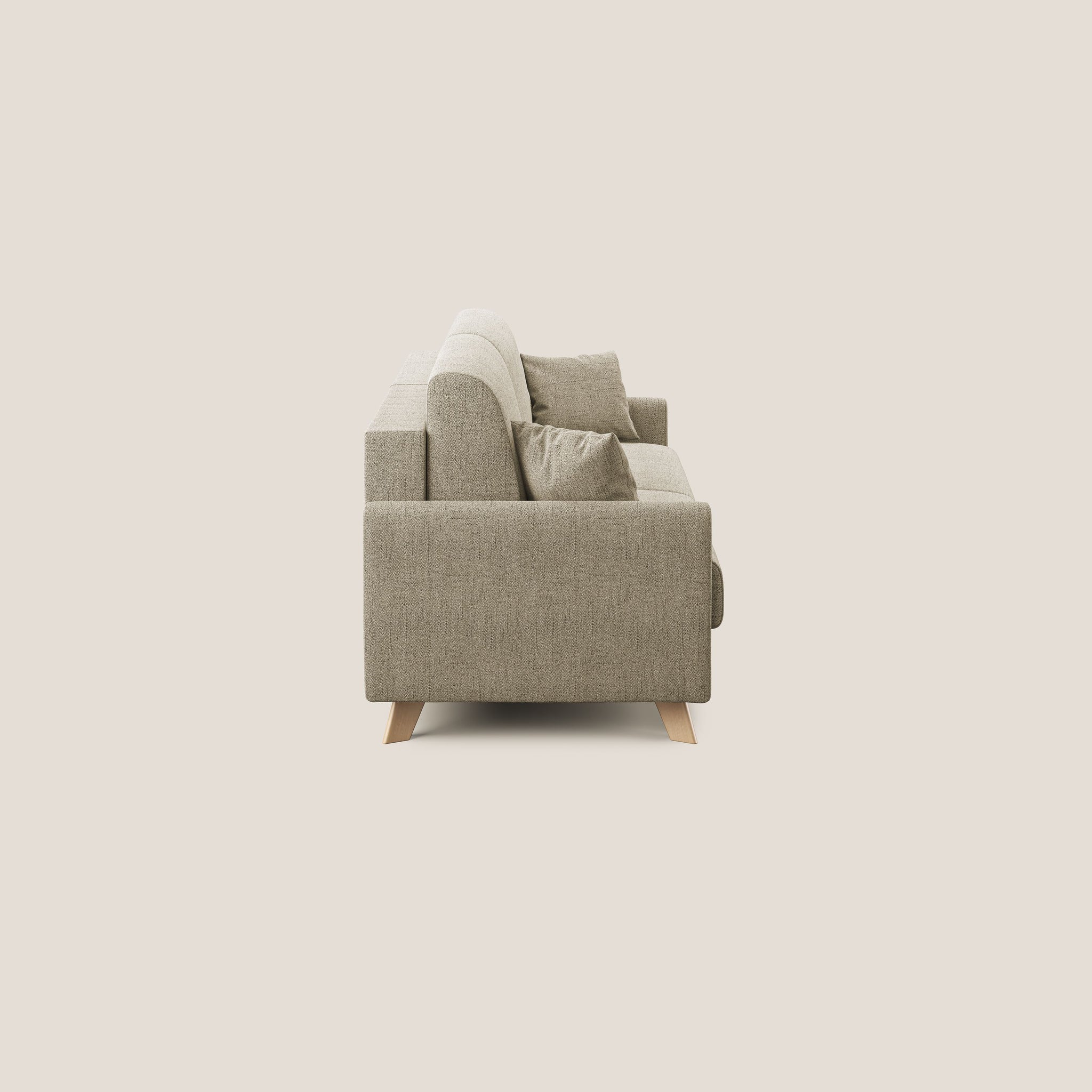 Vista laterale del divano letto Edgar da 200 cm in tessuto impermeabile beige T03 su uno sfondo semplice. Realizzato da Divani.Store in Italia, questo divano presenta un design moderno e minimalista con linee pulite e due cuscini di seduta e schienale. Cuscini quadrati abbinati ne esaltano lo stile, mentre poggia su gambe angolate in legno chiaro.