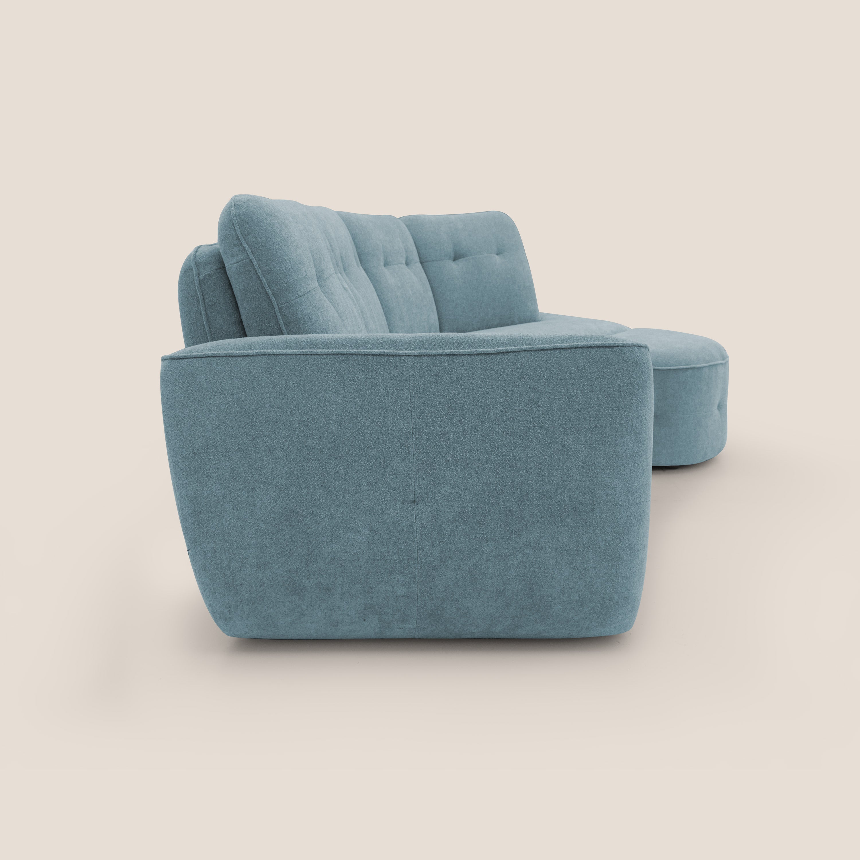 Cerbero divano angolare con pouf mobile in morbido bouclé impermeabile T07 carta da zucchero - divani.store