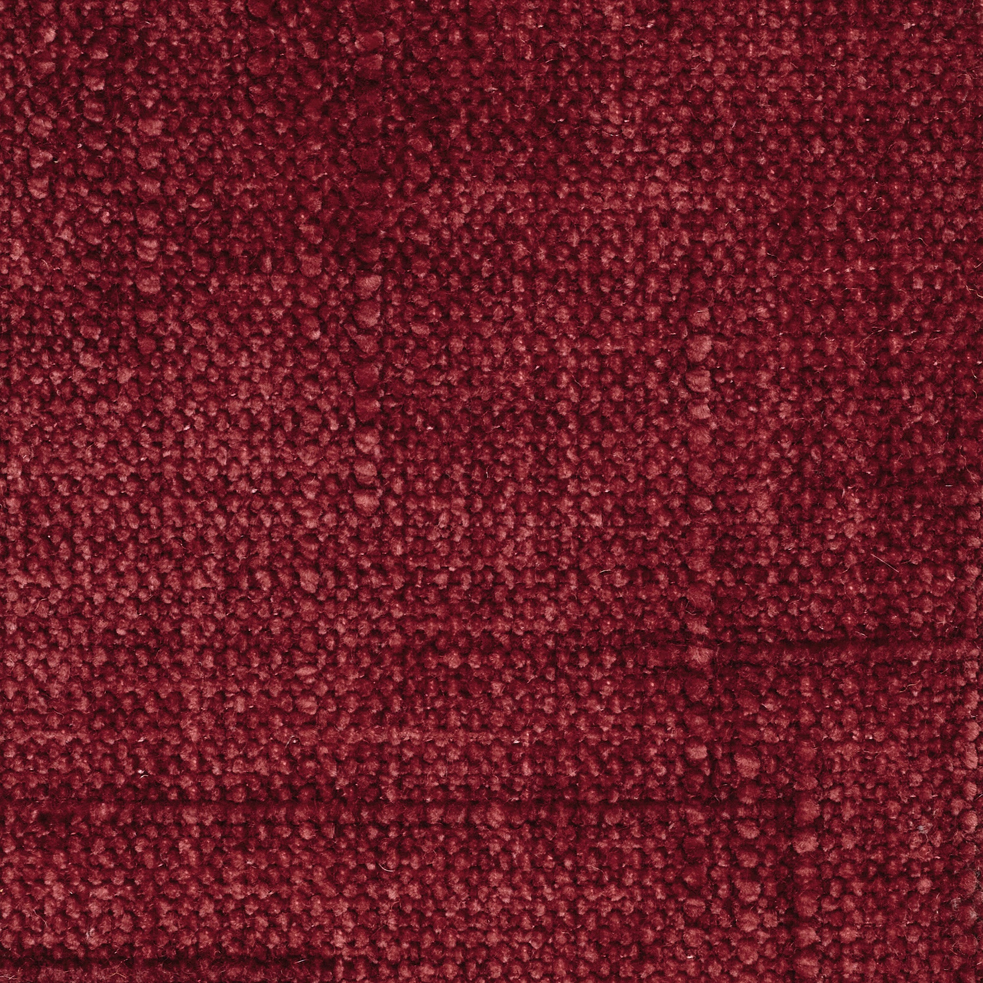 Primo piano di Personalizzazione in T22 di Divani.Store: un tessuto rosso intenso con una superficie morbida e anellata e un sottile motivo a griglia. Le ricche variazioni di colore creano un aspetto tattile, ideale per rivestimenti o accenti decorativi.