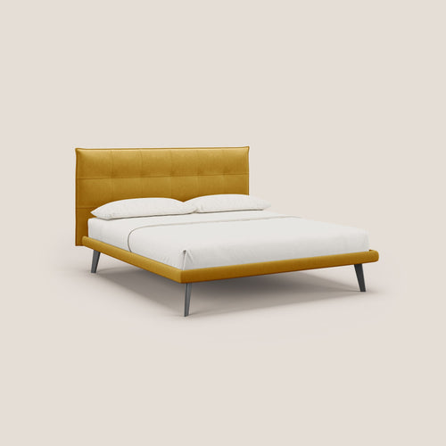 Brigitte letto con testata trapuntata piedi alti in mogano e tessuto impermeabile T09 giallo - divani.store