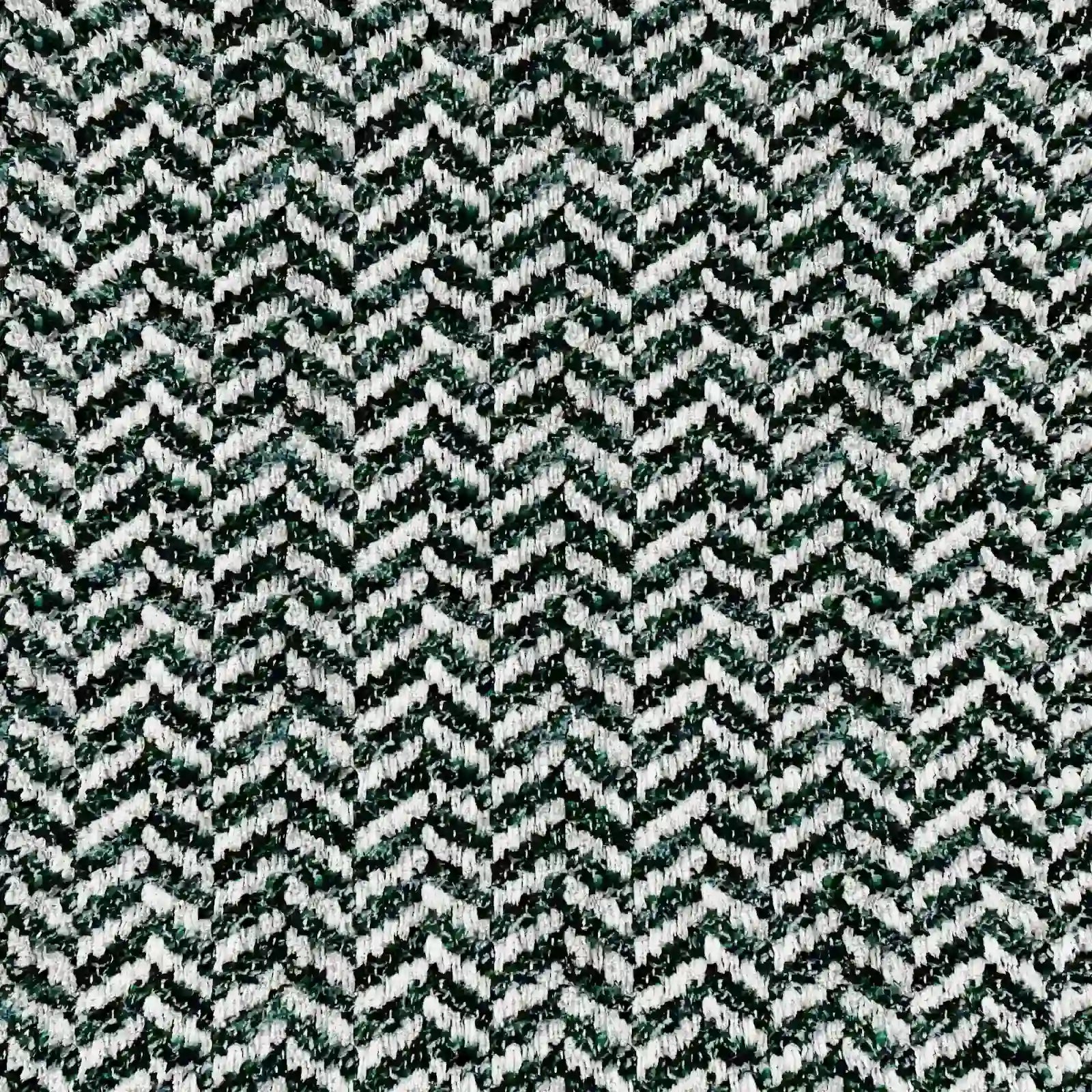 Primo piano del cuscino Sorrento 45x45 in Lino di Divani.Store, caratterizzato da un’elegante lavorazione a spina di pesce realizzata con filati neri, bianchi e verde scuro che creano un effetto chevron: ideale per cuscini decorativi alla moda e impermeabili.
