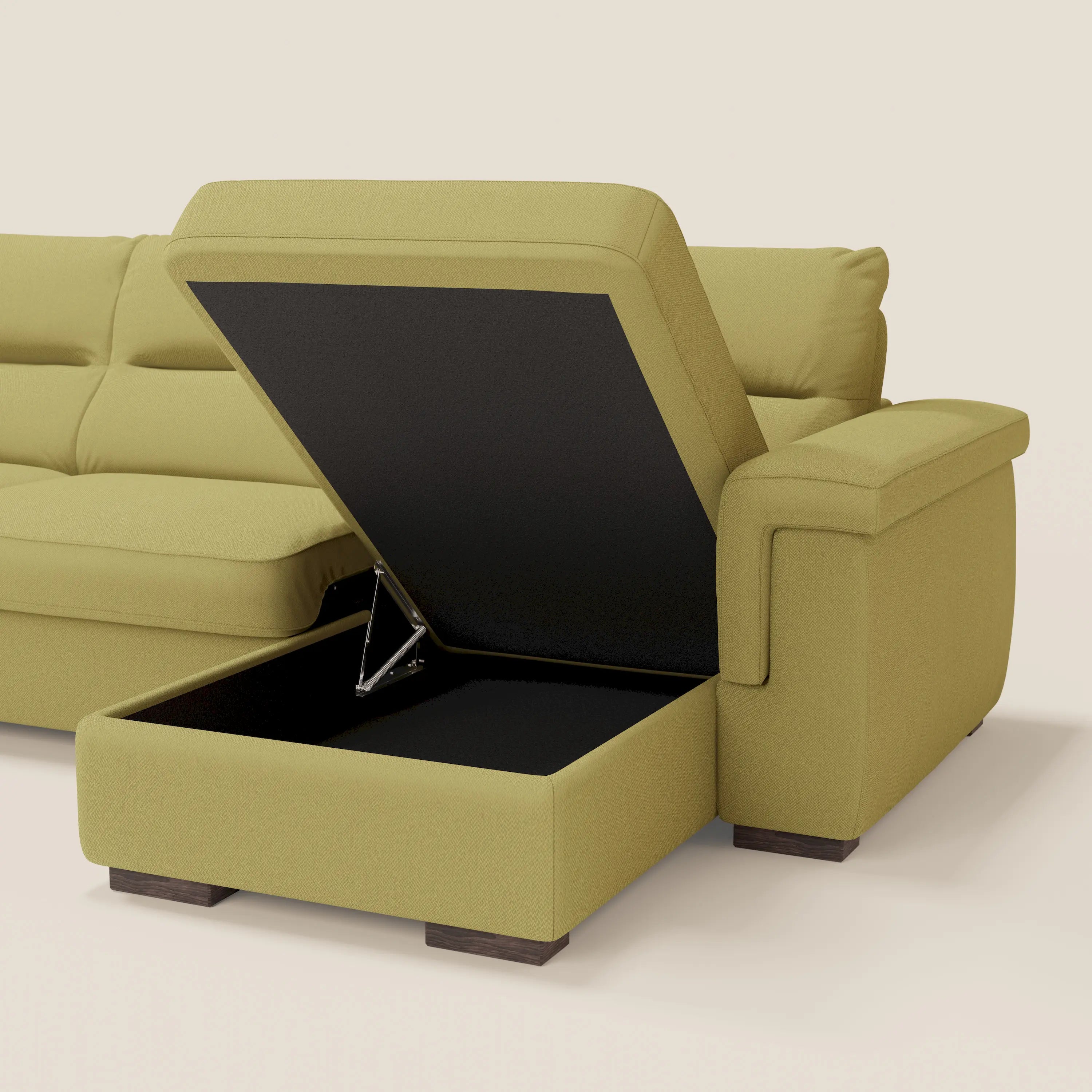 Il divano letto angolare Magnolia con Penisola Contenitore di Divani.Store in smacchiabile T05 giallo offre una poltrona contenitore nascosta, cuscini morbidi, ampi braccioli e gambe corte e scure, combinando comfort e stile per qualsiasi spazio.
