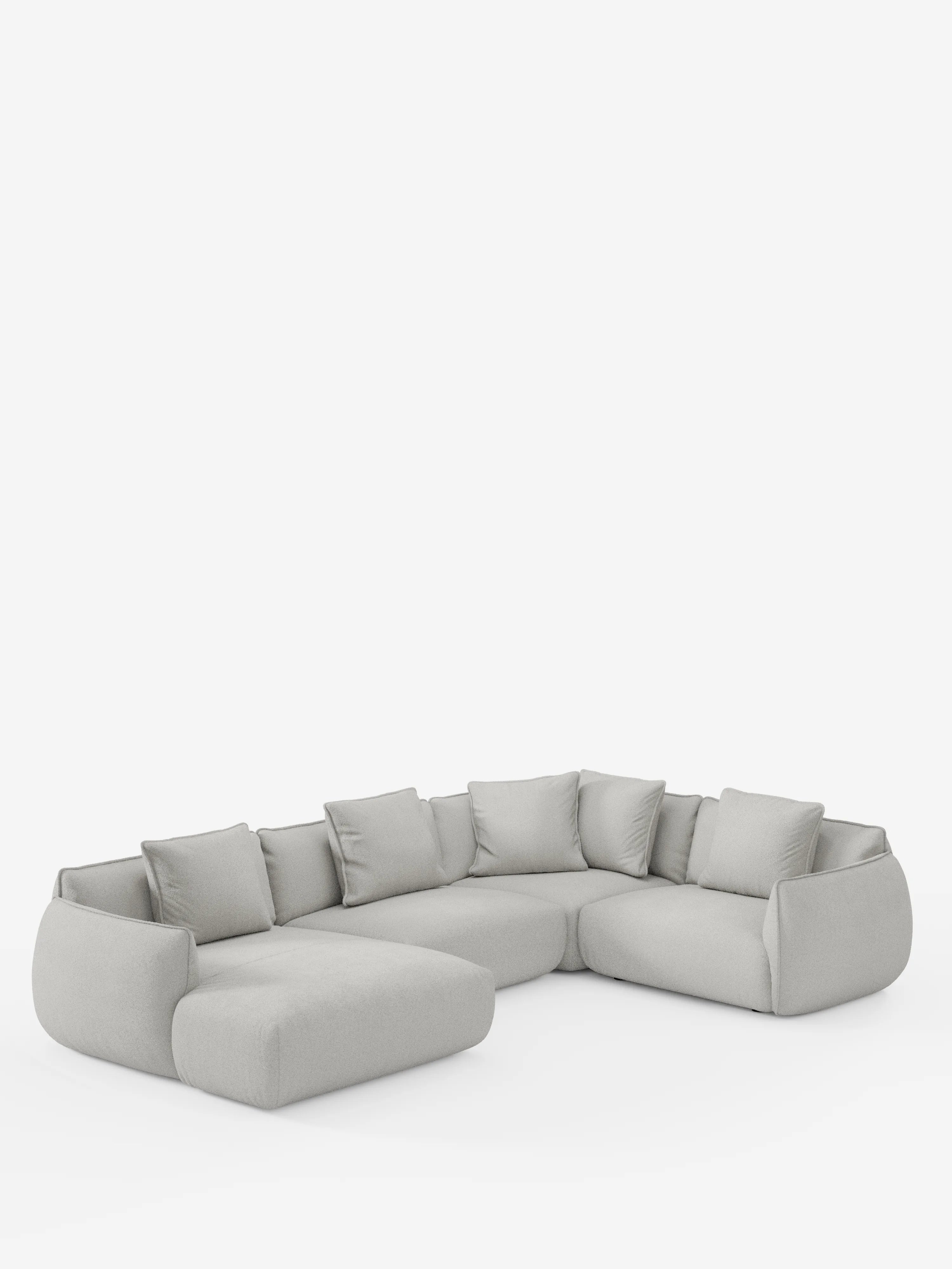 Divano angolare panoramico componibile Nimbus, in stile moderno, color grigio chiaro, con sei cuscini di seduta, sette cuscini dello schienale sfoderabili e bordi arrotondati, di Divani.Store. Rivestito in morbido tessuto T33 resistente alle macchie, questo divano componibile minimalista Made in Italy presenta una configurazione con chaise longue e angolo. Immagine raffigurata su sfondo bianco.