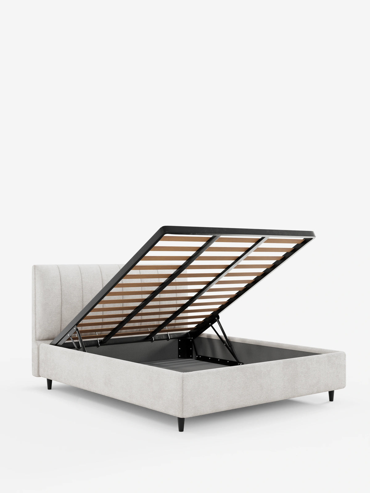 Un letto imbottito ONYX con contenitore e testiera verticale in tessuto certificato Oeko-Tex® color beige, caratterizzato da una rete a doghe rialzata e da un’alta testiera a pannelli su sfondo bianco.