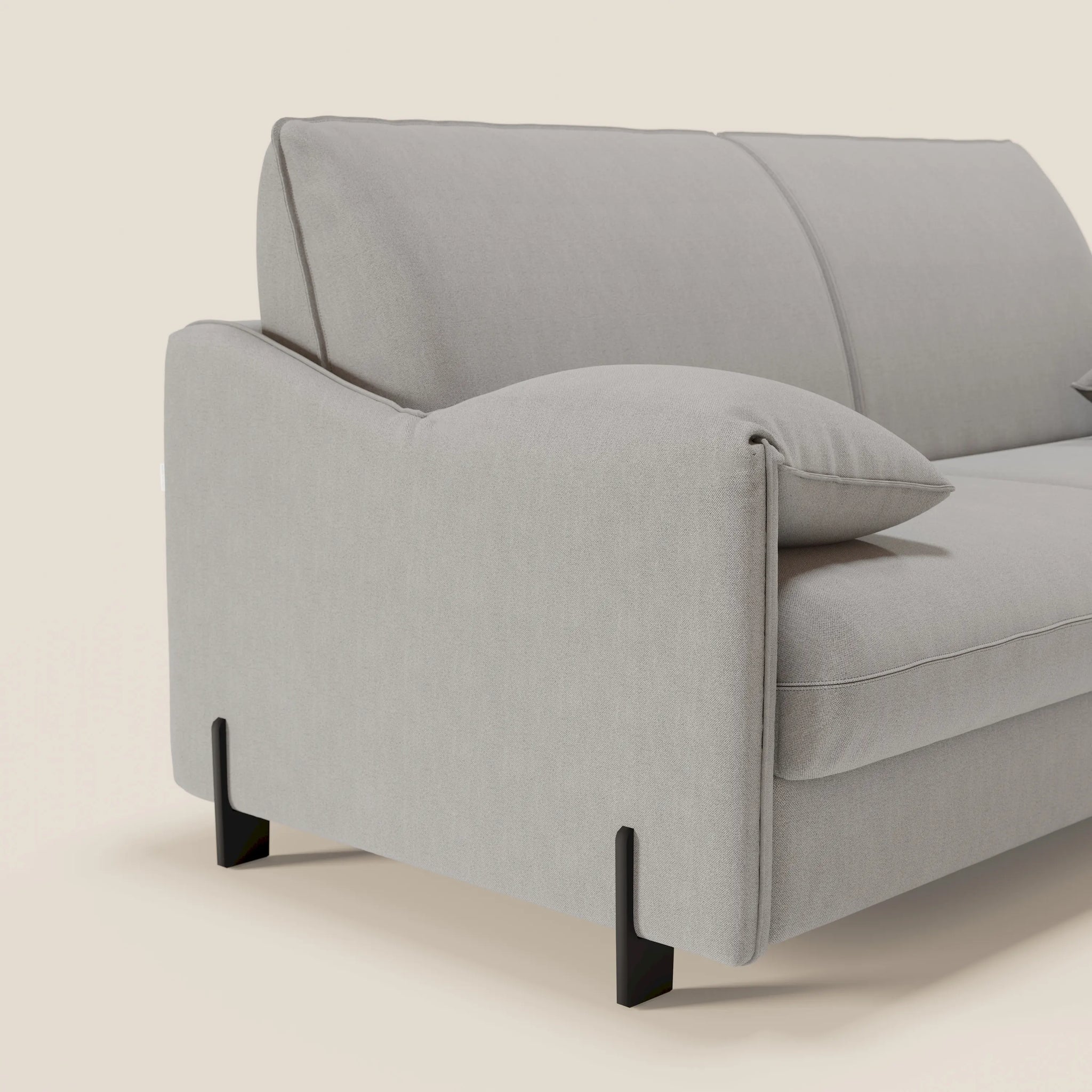 Il divano letto Primula da 177 cm di Divani.Store è dotato di braccioli mobili, tessuto antimacchia T05 GRIGIO, cuscini morbidi e gambe in metallo nero. Il suo design elegante e minimalista presenta bordi morbidi e arrotondati per un comfort contemporaneo.