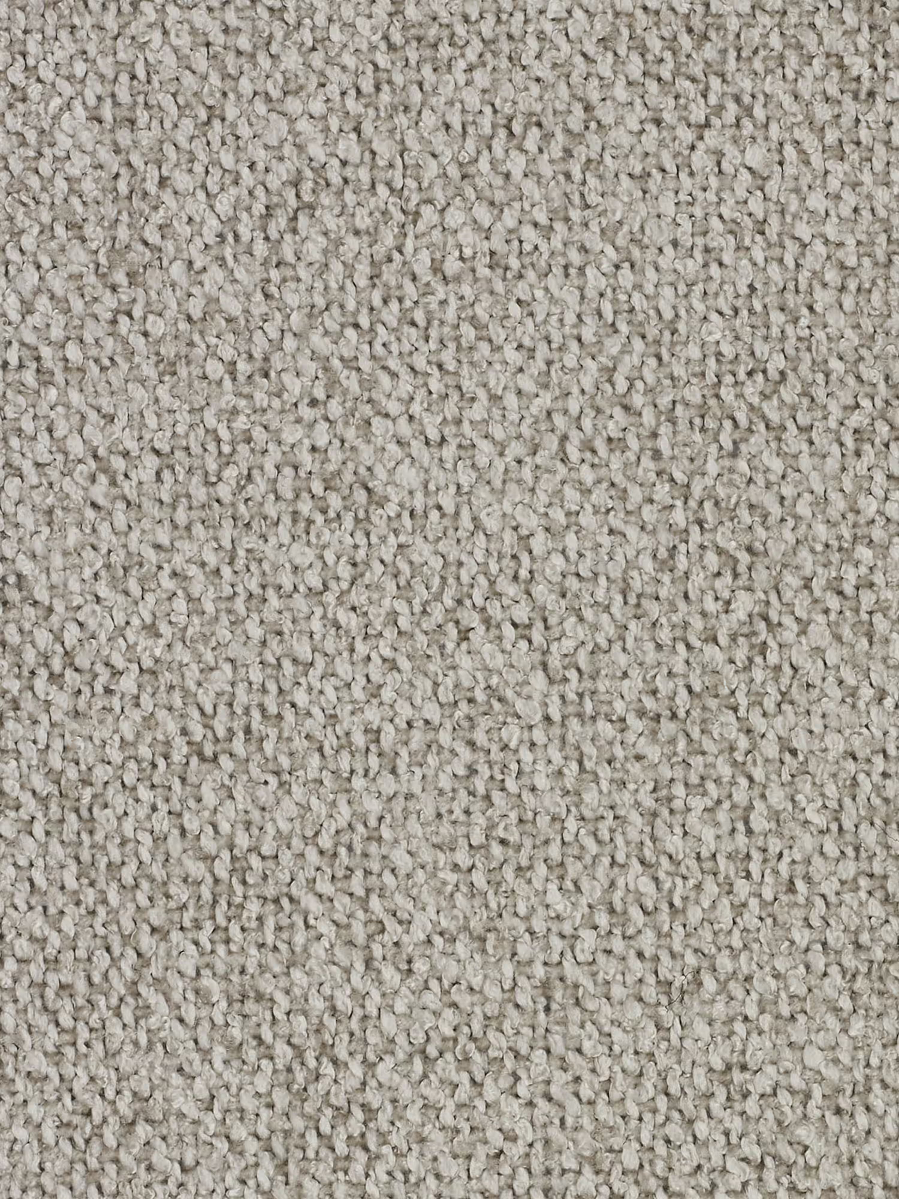 Primo piano di un tappeto beige dalla trama testurizzata con fibre a riccioli fitti, che creano una superficie uniforme e morbida: una base ideale per gli interni contemporanei. Il motivo è uniforme e presenta una tonalità chiara e neutra che si abbina perfettamente al divano Orbit a 2 e 3 posti con sedute scorrevoli di Divani.Store. Con il suo tessuto T33 effetto cotone, completamente sfoderabile e resistente alle macchie, le linee pulite di questo divano sono esaltate dall’eleganza sobria della moquette.