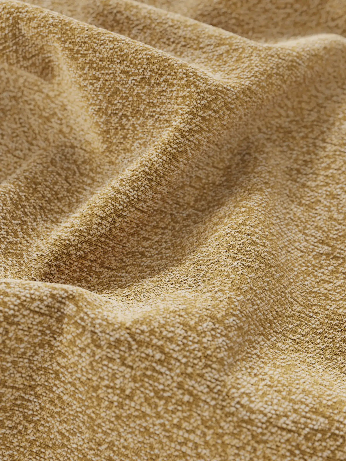 Primo piano su un tessuto giallo senape dalla ricca trama intrecciata, che mette in risalto le delicate pieghe del letto di design VALKIRIA con vano contenitore e testiera avvolgente, evidenziando il motivo granuloso a tratteggio incrociato del materiale.