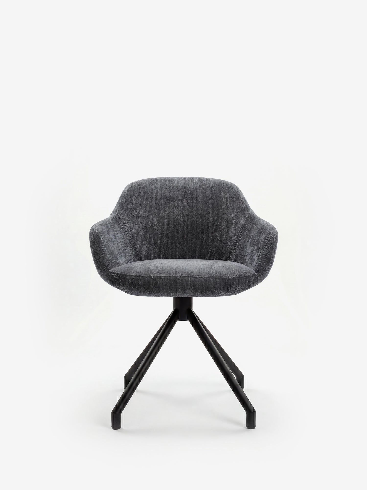 La sedia imbottita Vico di Divani.Store è realizzata in tessuto OEKO-TEX® morbido al tatto di colore grigio scuro, presenta schienale e seduta arrotondati e gambe angolate in metallo nero: perfetta per gli spazi contemporanei su uno sfondo bianco.