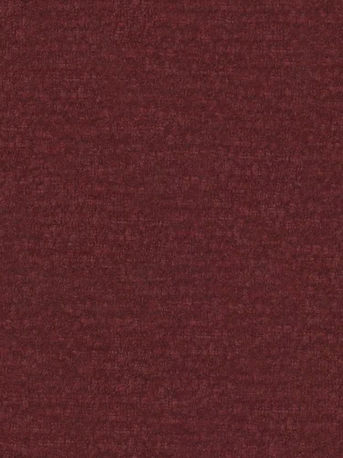 Primo piano del tessuto bordeaux a trama rigata del letto imbottito ONYX con contenitore e testiera verticale in tessuto certificato Oeko-Tex® di Letti.store. Il tessuto appare morbido e vellutato, con sfumature delicate e variazioni di rosso intenso che suggeriscono una trama tessuta e soffice, perfetta per esaltare il comfort raffinato e l’eleganza di questo letto imbottito con contenitore.