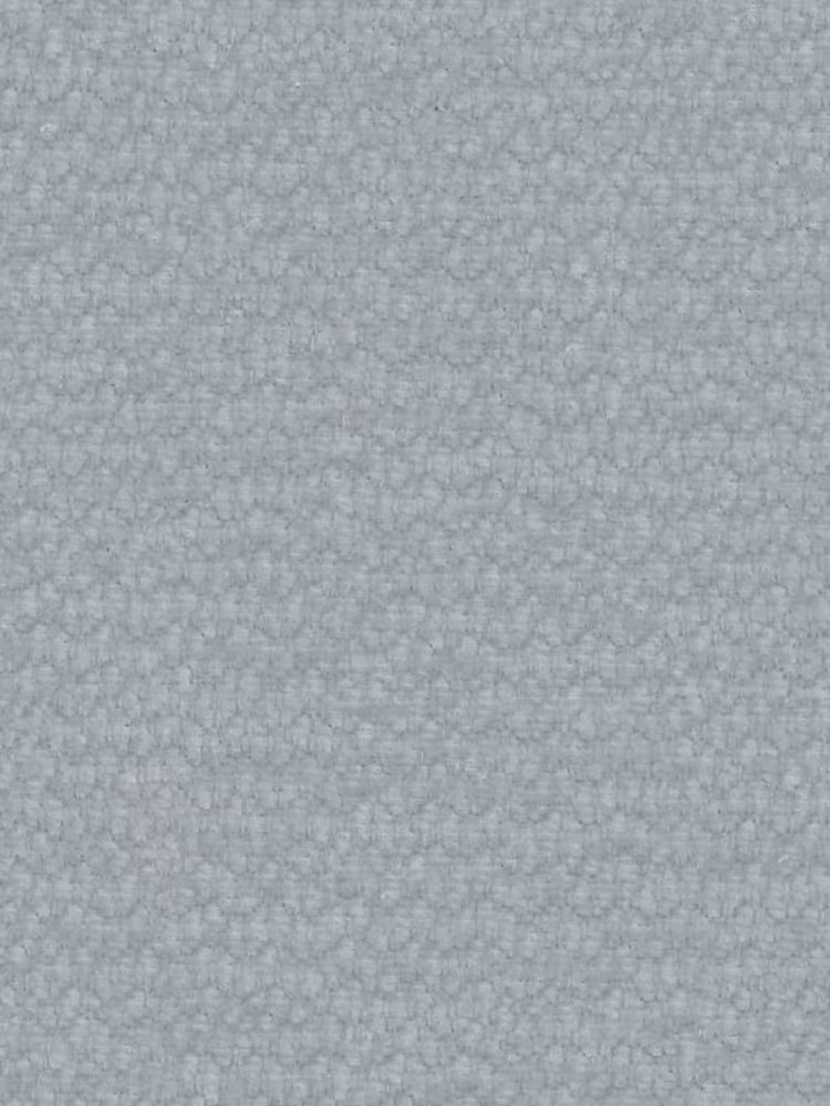 Primo piano del tessuto da rivestimento grigio chiaro e testurizzato utilizzato per il letto imbottito ONYX con vano contenitore e testiera verticale in tessuto certificato Oeko-Tex® di Letti.store. Il tessuto presenta una trama fitta con un motivo a piccoli anelli, una finitura morbida e opaca e una colorazione uniforme, che lo rendono una scelta eccellente sia per la testiera imbottita che per la superficie del letto. Non sono presenti macchie o segni visibili.