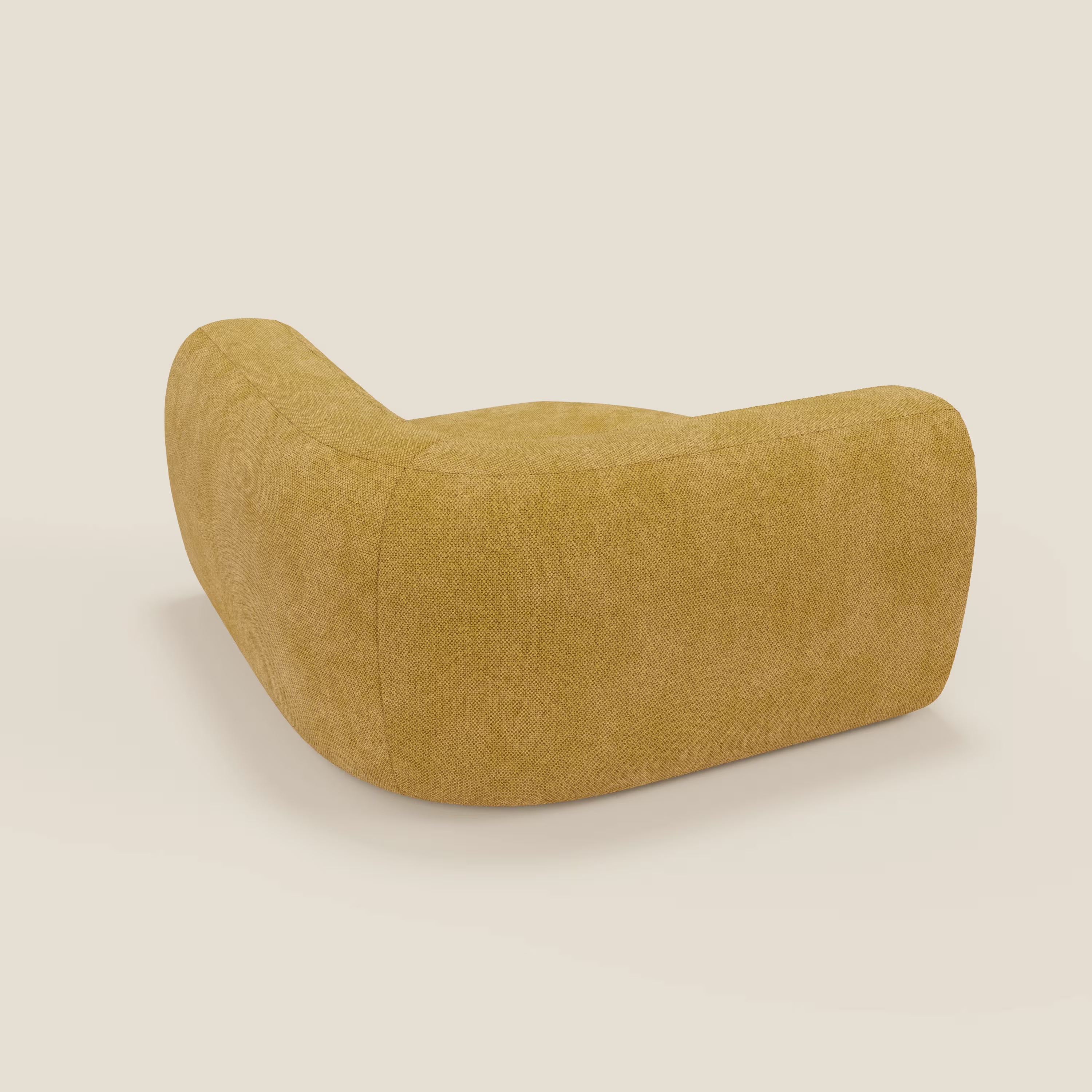 BonBon Modulo angolare di Divani.Store è un divano modulare GF edition di colore giallo, caratterizzato da bordi morbidi e arrotondati e da un profilo basso. L'ampia seduta e lo schienale curvo spiccano su uno sfondo bianco sporco per un look moderno e minimalista.