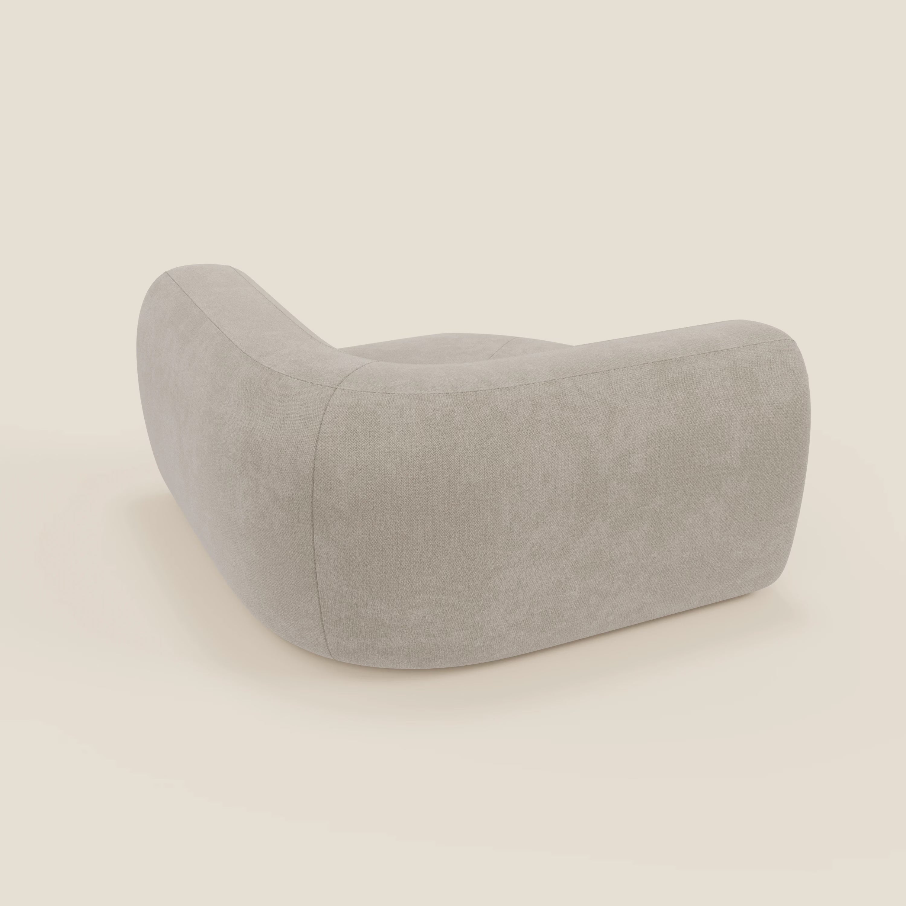 Bonbon Modulo angolare di Divani.Store è un moderno divano componibile in tessuto panna T23, facile da pulire, caratterizzato da bordi morbidi, ampia seduta e braccioli curvi per un relax elegante e confortevole.