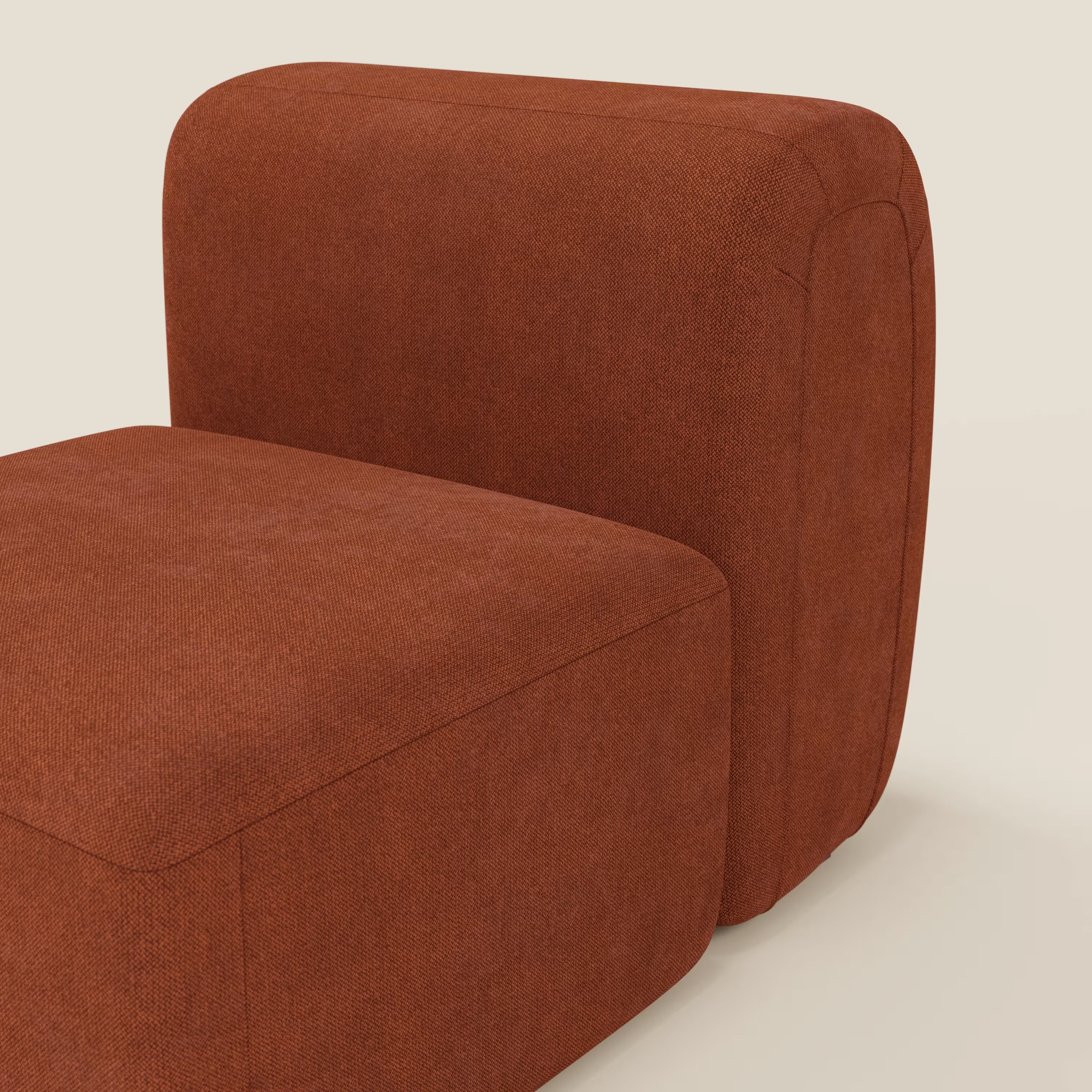 Il BonBon modulo centrale 70 cm di Divani.Store è una poltrona o elemento componibile senza bracciolo, dal design minimalista e dai bordi arrotondati. Rivestita in tessuto smacchiabile T23 ruggine, presenta uno schienale basso.