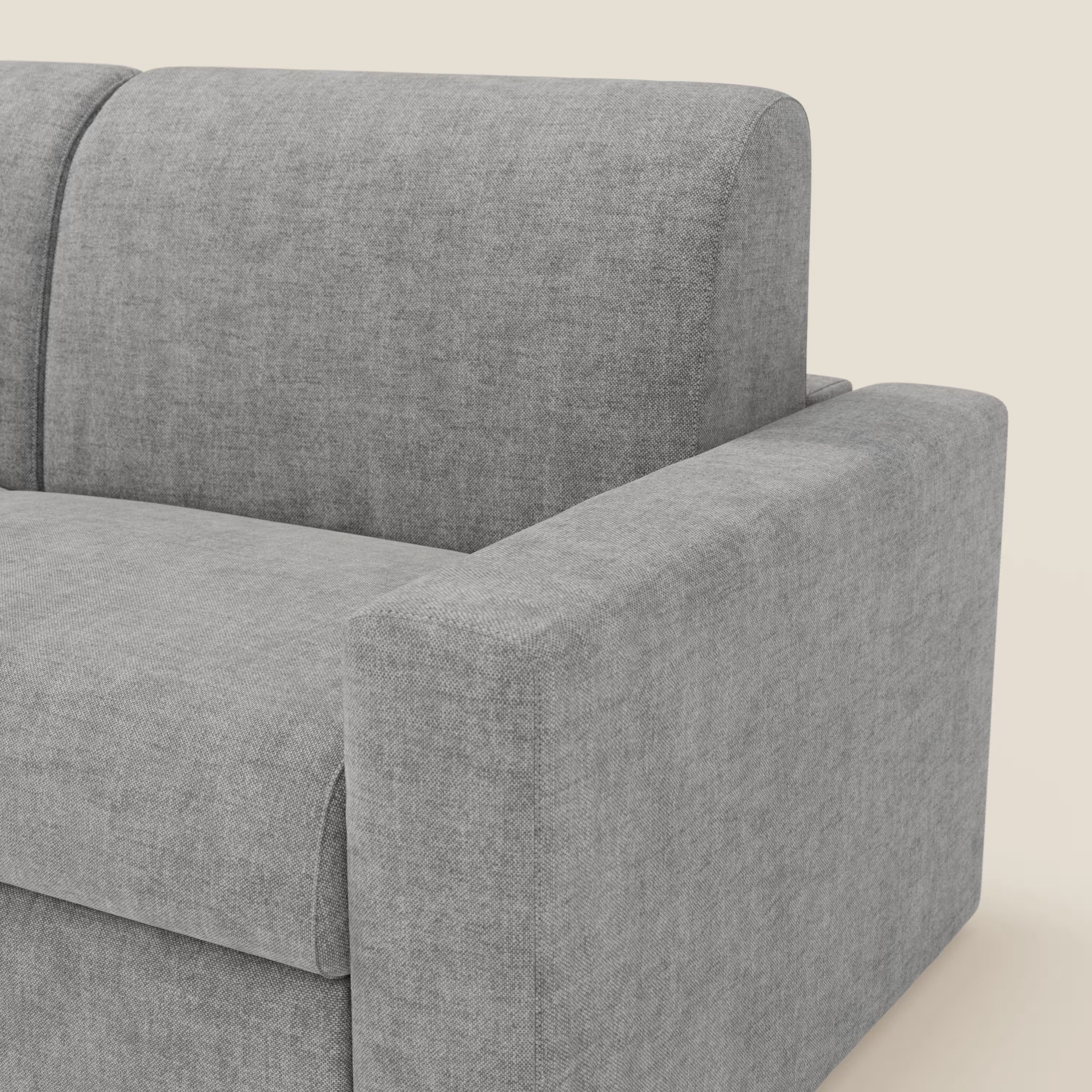 Primo piano del Divano letto matrimoniale in velluto easy clean sfoderabile di Divani.Store, T35 grigio: mostra il suo design moderno, le linee pulite, la texture morbida, lo schienale, il cuscino di seduta e l'ampio bracciolo su uno sfondo chiaro.